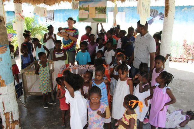 Eddy and Rich with the children at the orphanage