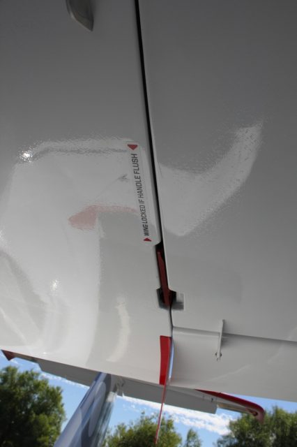 ICON A5 Wing Folding Levers Stowed - we also check the security at the wing tip and stabilizer tip security